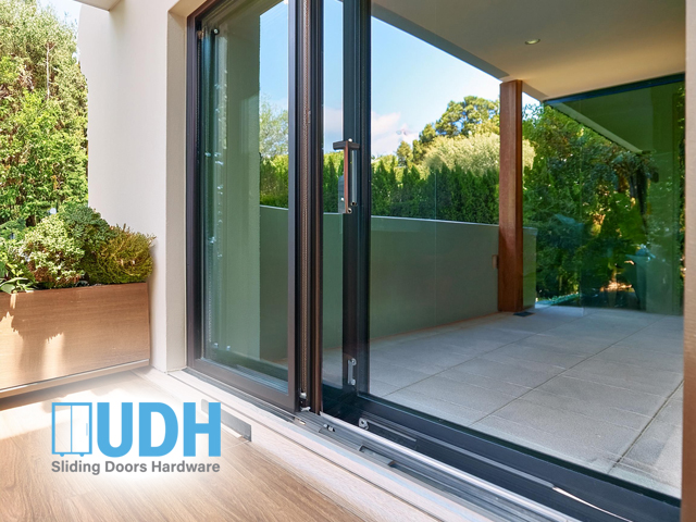 closeup of sliding door hardware innovative tracks and rollers beautiful sliding glass door in residential property